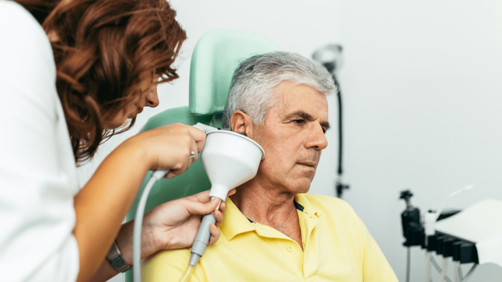 Patient getting an earwax removal services at Omnicare pharmacy